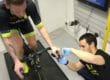 Man on bike taking blood lactate test
