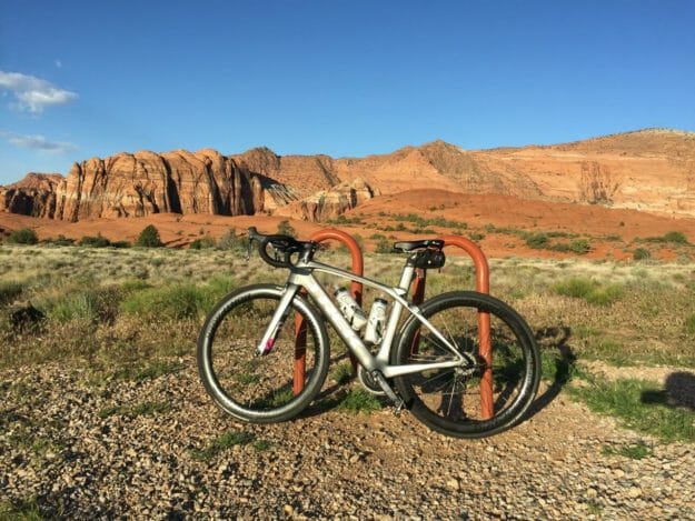 Bike Trek Madone 9 on a sunny day with rock mountains in the background